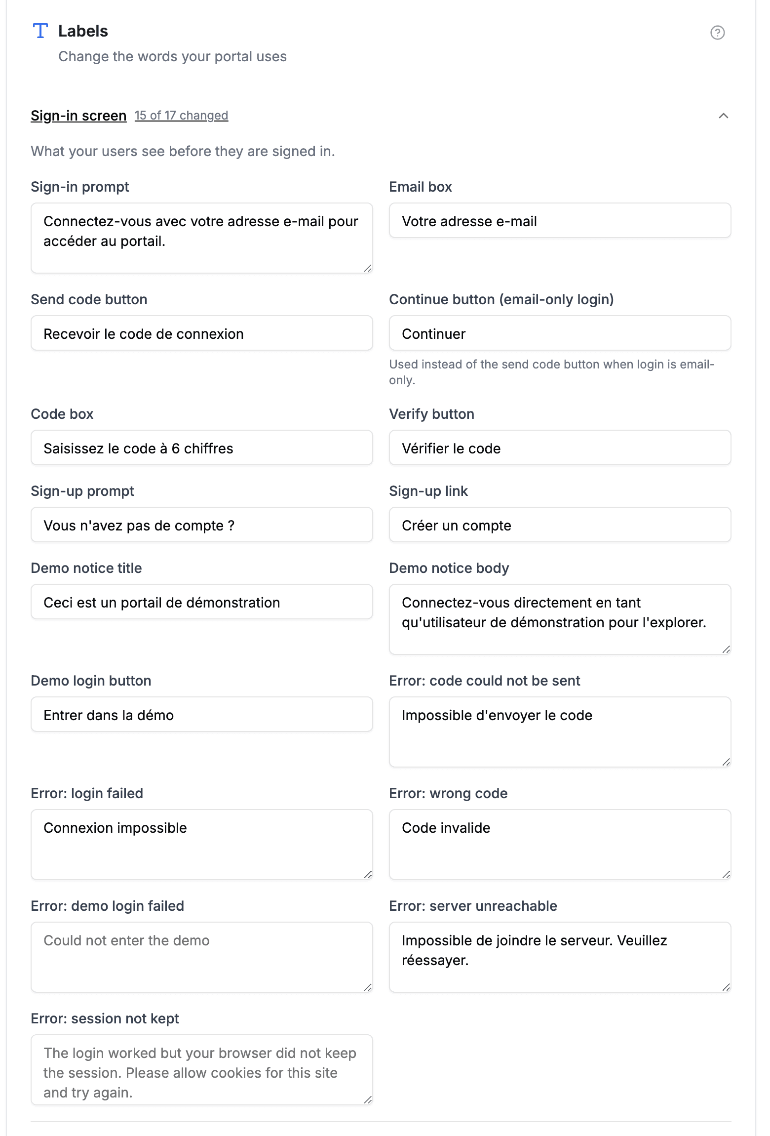 The Sign-in screen section of the Labels tab, with French wording filled into most boxes and the untouched boxes showing the built-in English in grey