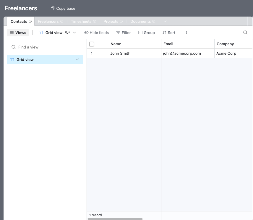 The Freelancers Airtable base with tables for projects, timesheets, documents and contacts